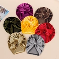 Set of seven velvet baby turban hats with large bows in assorted warm colors - Random Color