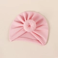 Close-up of pink waffle texture baby donut hat with soft ribbed knit fabric details - 18*17cm / Light Pink