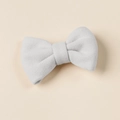 Close-up of a soft grey imitation cashmere bow hair clip on a warm beige background - 8.5*6cm / Light Gray