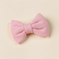 Detailed view of pink knitted bow hair clip featuring premium wool texture and fabric - 8.5*6cm / Dusty Pink