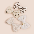 Lot de quatre barrettes à nœud en coton pour filles aux motifs fleurs et vache - 8.5*5.5cm / Couleur Aléatoire