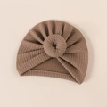Detailed texture of ribbed knit baby turban with large donut knot in warm brown - 18*17cm / Light Coffee