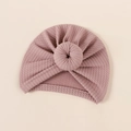 Close-up of mauve waffle knit baby donut hat with decorative knot on soft background - 18*17cm / Korean Pink