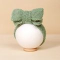 Salbeigrüne Kinderstirnband aus Lammwolle mit einer großen, flauschigen Schleife - 17*9.5cm / Grün