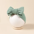 Détail du bandeau bébé vert menthe avec tricot jacquard texturé et nœud à double couche - 16*8.5cm / Vert