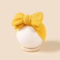 Détail du bandeau jacquard jaune doux avec un grand nœud texturé pour les nourrissons - 16*8.5cm / Jaune