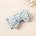 Detail of light blue waffle knit fabric and large double layered bow on baby headband - 16x8.5cm / Off-White