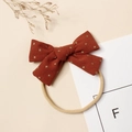 Détail de bandeau bébé avec nœud en velours côtelé à pois dorés et ruban nylon - 9.5*6cm / Orange