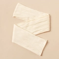Close-up of cream white cable knit nylon fabric showing texture for baby headbands - Off White