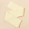 Detailed view of cream nylon jacquard fabric with cable knit pattern for baby headbands - Light Yellow