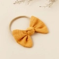 Ginger yellow bow headband with soft linen fabric and elastic nylon for infants - Earthy Yellow