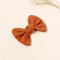 Terracotta ribbed fabric bow hair clip for girls with a minimalist knot design - Orange Red