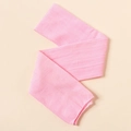Close-up of pink nylon jacquard headband fabric featuring detailed cable knit patterns - Water Pink