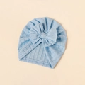 Macro detail of baby turban featuring light blue textured knit fabric and big bow - Sky Blue