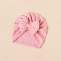 Detail of the soft pink pleated jacquard fabric and large bow on the baby turban - Light Pink