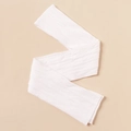 Detail showing the intricate white cable knit pattern and elastic texture of the fabric - White