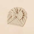 Detail of baby turban hat with ribbed knit texture and large soft bow decoration - Khaki