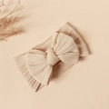 Close-up of beige knitted baby headband featuring a large jacquard bow and soft texture - 16*9cm / Dirty White