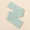 Detail of mint green baby nylon headband showing soft jacquard knit texture and elasticity - Grey Blue