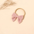 Dettaglio della fascia per neonati con fiocco a farfalla ricamato rosa e nylon - Rosa Chiaro