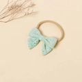 Detail of mint green eyelet lace bow baby headband with soft high elastic nylon band - Mint Green