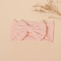 Detail of baby pink nylon headband with a large eyelet embroidery hollow bow - Light Pink