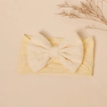 Detail of baby yellow nylon headband with a large off-white embroidered lace bow - Light Yellow