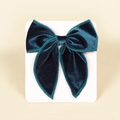 Navy blue velvet bow hair clip for girls on a white display card with sleek finish - 13cmx12.5cm / Dark Green