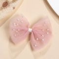 Detail of pink mesh bow hair clip with faux pearls and soft fabric wrap for girls - Pink