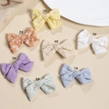 Handmade cotton bow hair clip set for kids with floral embroidery in seven soft colors - Random Color