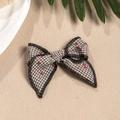 Detail of vintage plaid bow hair clip with cherry print and fine black stitching - Brown And White Gingham Style (2)