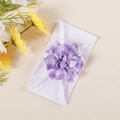 Detail of soft nylon baby headband featuring a purple and white checkered floral bow - White Purple Gingham