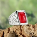 Macro view of vintage gold ring featuring a red gemstone inlay and engraved details - Silver Red Zircon