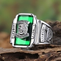 Detail view of vintage stainless steel Walton Tigers ring with tiger head on green stone - US 7 / Silver With Green Zircon