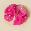 Detailed view of oversized pink tulle bow headband with shiny metallic gold dots - Rose Red