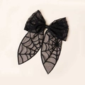 Detail of Halloween black lace bow clip featuring translucent spider web mesh pattern - Spider Web Style