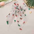 Detail of Christmas organza bow hair clip with festive tree and gift prints - Gift Box