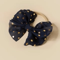 Detail of baby bow headband in navy blue mesh with gold metallic dots and elastic nylon strap - Navy Blue