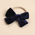 Detailed view of the dark blue velvet bow hair tie with a cream elastic band and soft texture - Navy Blue