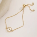 Bracciale regolabile placcato oro 18K con ciondolo a croce in madreperla e zirconi - Stile Croce (32426)