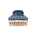 Detalle de pinza para el pelo en acetato azul oscuro con pedrería y dientes dorados - Azul marino