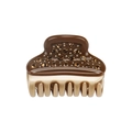 Detalle de la pinza de pelo de acetato marrón con pedrería y dientes metálicos oro champán - Café