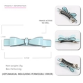 Barrette nœud en acétate bleu clair avec bord noir et pince à ressort en métal argenté - Bleu clair