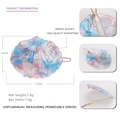 Détail d'une pince à cheveux coquillage en acétate rose et bleu avec strass dorés - Style Zircone / Bleu Océan