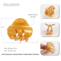 Amber acetate hair claw clip with tortoiseshell finish measuring 5.4cm x 4.0cm - Gold
