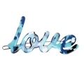 Detailed macro view of the marble blue acetic acid love hair clip with silver metal base - Blue