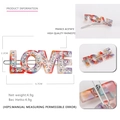 Funkelnde LOVE Buchstaben Haarspange mit hochwertigen Strasssteinen und Acetat - Mehrfarbig
