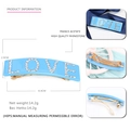 Detailweergave van hemelblauwe France Acetate haarklem met LOVE strassteentjes - Blauw LOVE