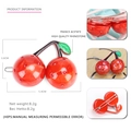 Detail showing cherry hair clip made of red acetate and crystals with dimensions - Red