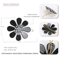 Sparkling black acetate flower hair clip with rhinestones and gold metal finish - Black